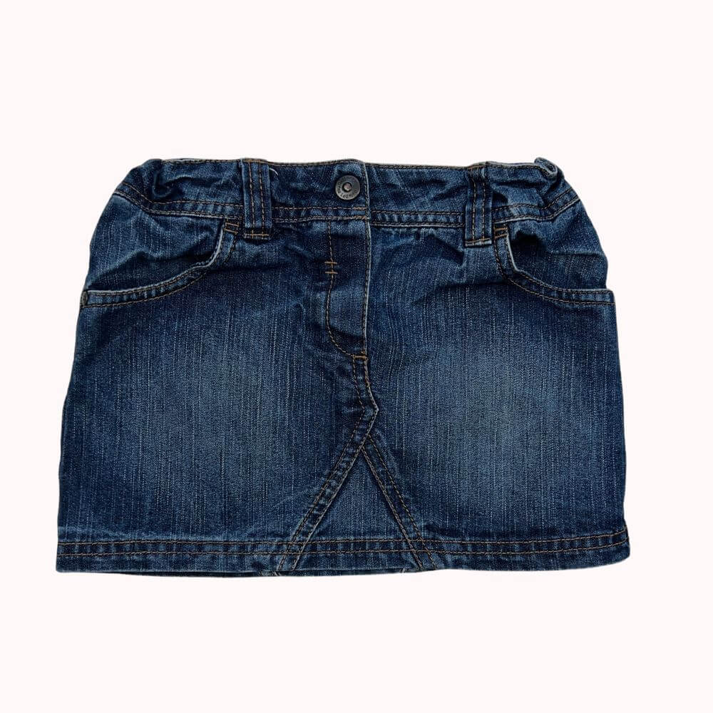 Jupe en jean pour fille 6 ans, en denim bleu avec zip, bouton et poche avant décorative.