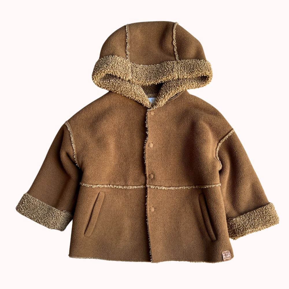 Manteau marron à capuche doublée effet mouton pour bébé 9-12 mois de la marque Zara.