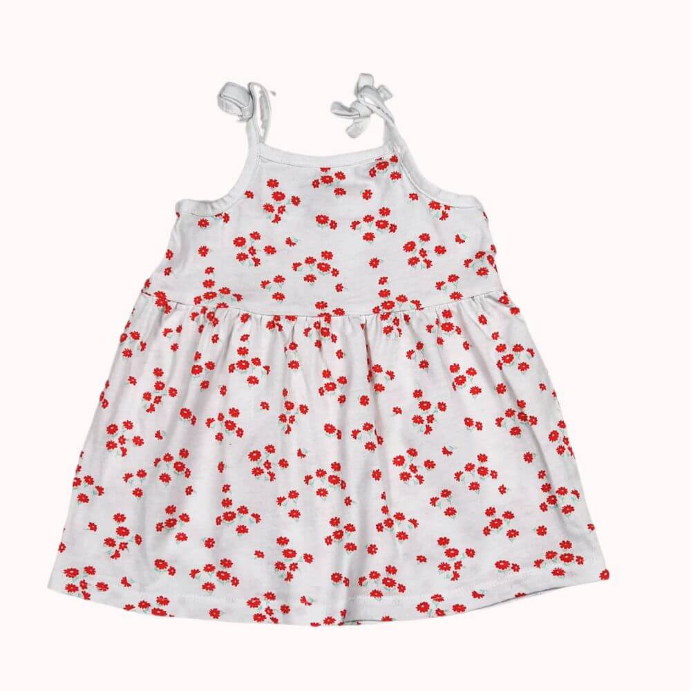 Robe bébé blanche à fleurs rouges avec bretelles nouées, taille 3 mois.