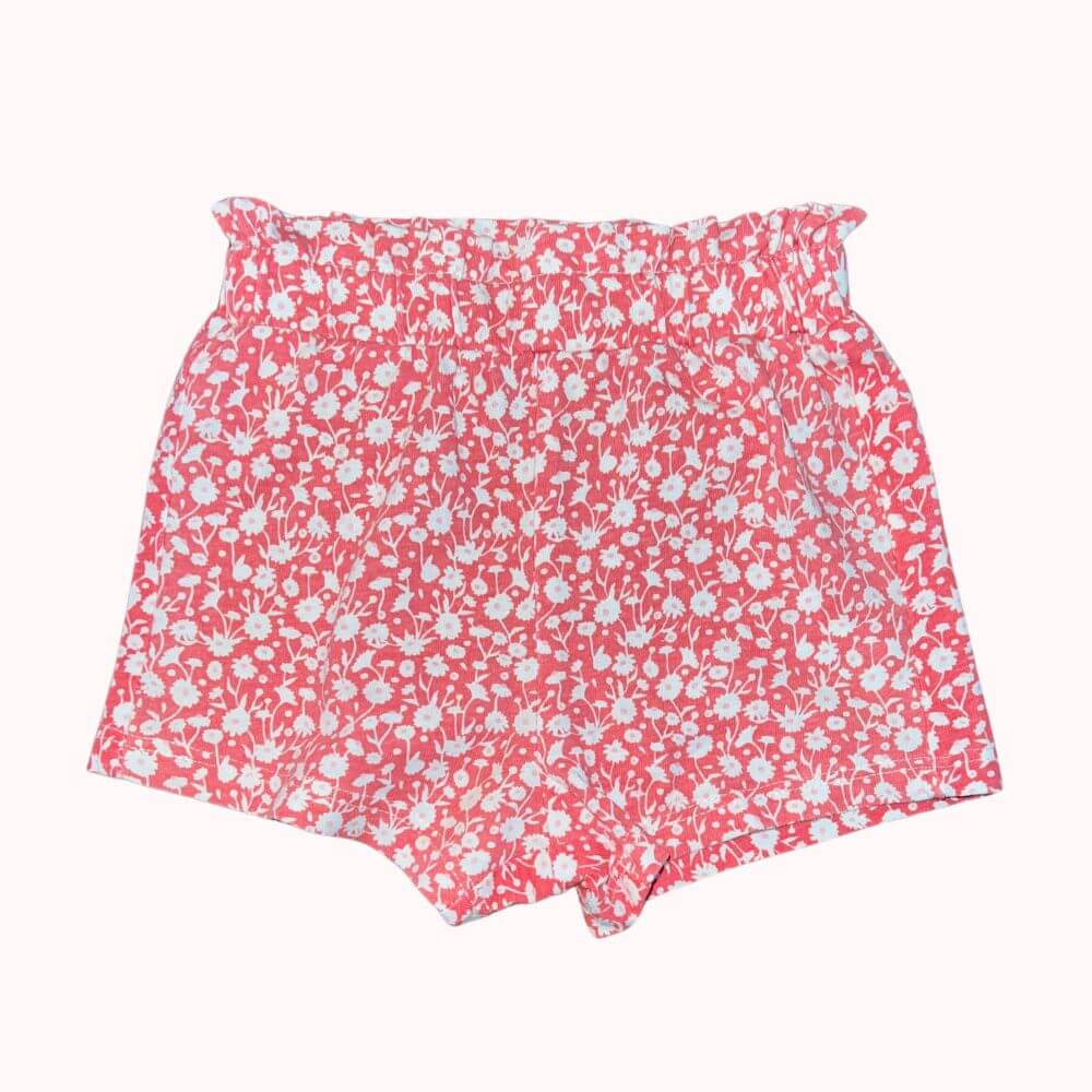 Short rose pour bébé à motifs fleuris blancs, de la marque KIABI, taille 3 mois.