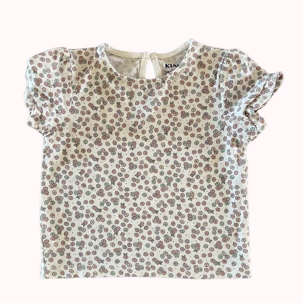 T-shirt bébé blanc imprimé fleuri, manches volantées, fermeture au dos, marque KIABI, taille 3 mois.