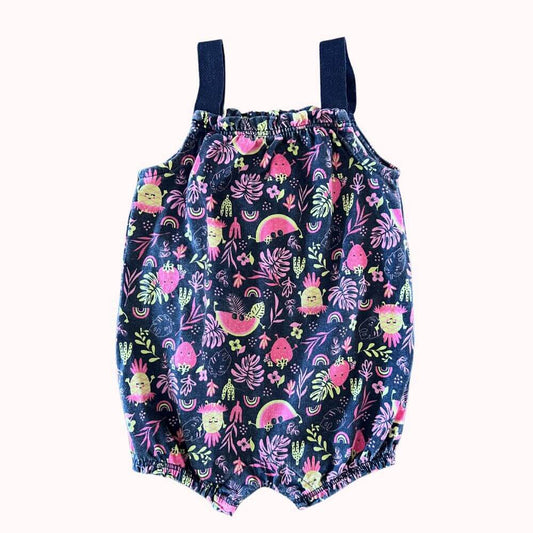 Barboteuse bébé à fond bleu marine, imprimé fruits et fleurs colorés, bretelles contrastées, marque Inextenso, taille 3 mois.