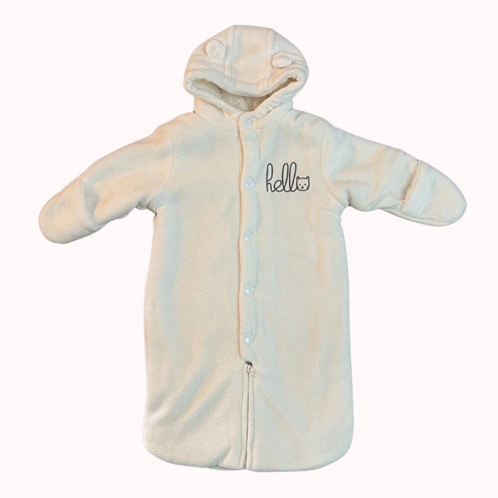 Combinaison pilote écrue pour bébé avec capuche à oreilles, inscription "hello" sur la poitrine, de la marque KIABI, taille 3 mois.