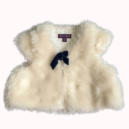 gilet bébé Sergent Major sans manches en fausse fourrure beige avec nœud en velours bleu marine, doublure à pois dorés, taille 3 mois.