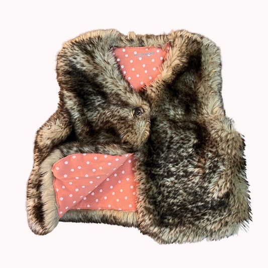 gilet bébé Vertbaudet sans manches en fausse fourrure marron avec doublure rose à pois blancs, taille 9 mois.
