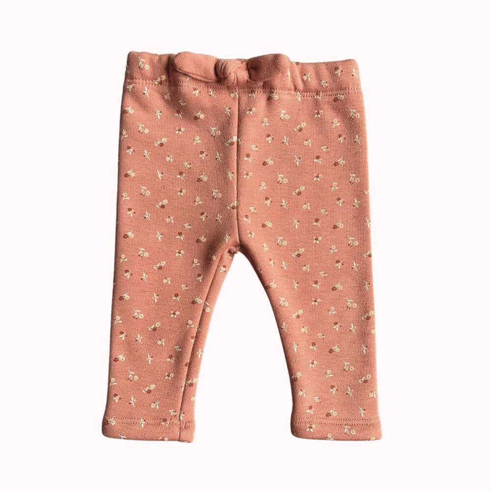 Pantalon doublé chaud en coton terracotta à petites fleurs, taille élastiquée et nœud décoratif, pour bébé 3 mois.