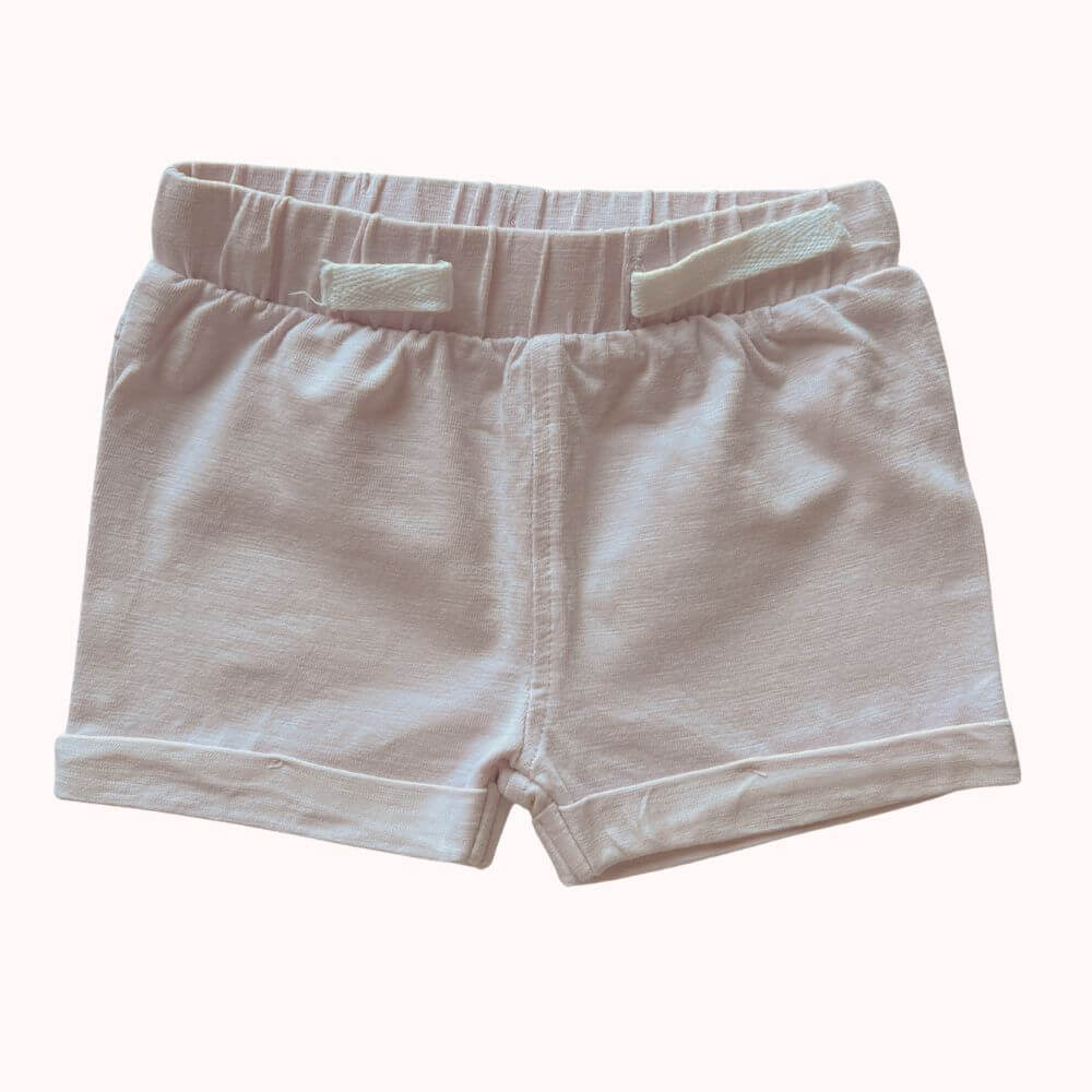 Short bébé rose clair Orchestra en coton avec taille élastique et cordon de serrage, taille 3 mois, vêtement bébé de seconde main.