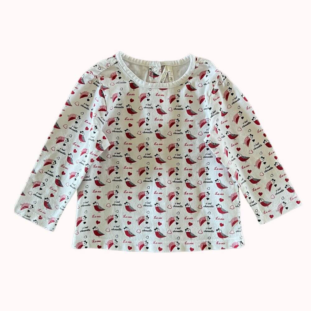 T-shirt bébé manches longues en coton blanc, imprimé oiseaux et messages poétiques, de la marque Orchestra, taille 9 mois.