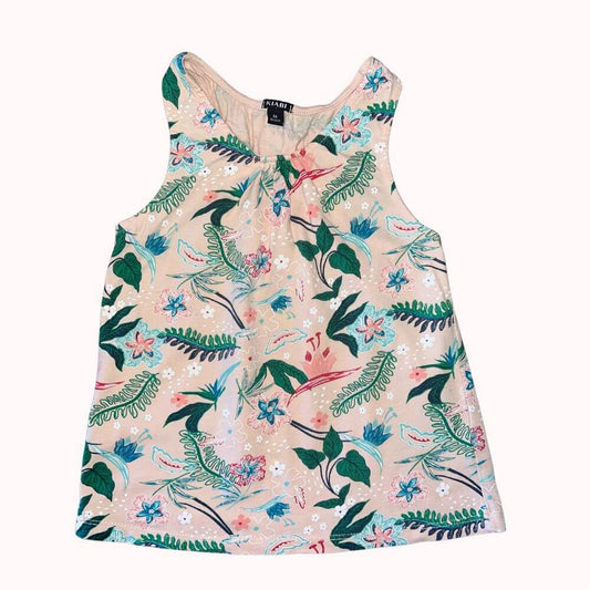  Top sans manches Kiabi 8 ans, fond pêche avec motifs floraux verts, bleus et rouges.