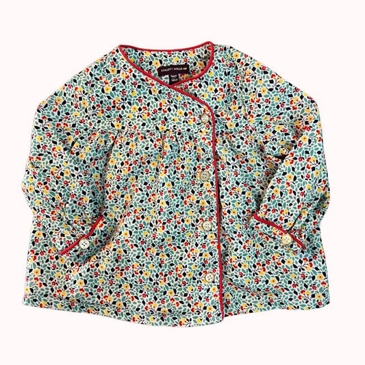 Tunique fleurie multicolore bébé 6 mois de la marque Sergent Major avec boutons devant et finitions rouges contrastantes.