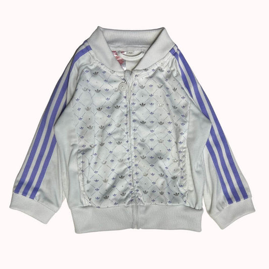 Veste Adidas blanche et violette pour bébé, taille 18 mois, avec fermeture zippée et bandes violettes sur les manches.